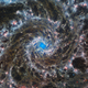 The Phantom Galaxy is a terrifying swirl of greys, reds, and blues in this infrared image.